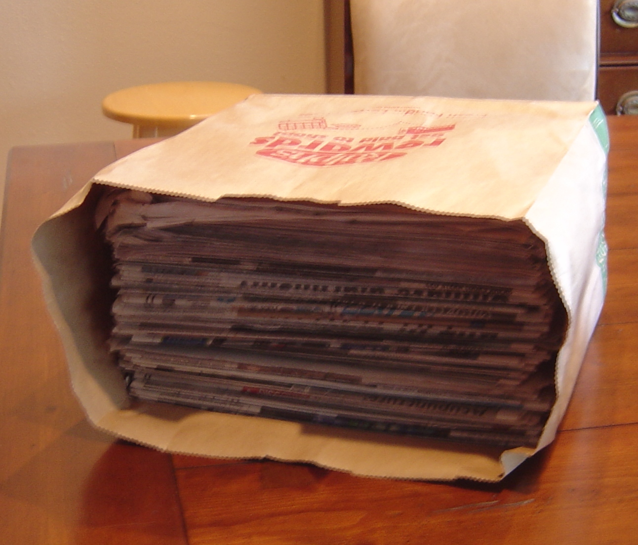 Filled brown paper bags stack easily in our bin.